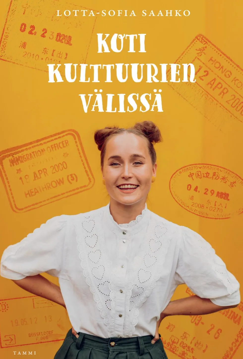 Koti kulttuurien välissä (signeerattu)